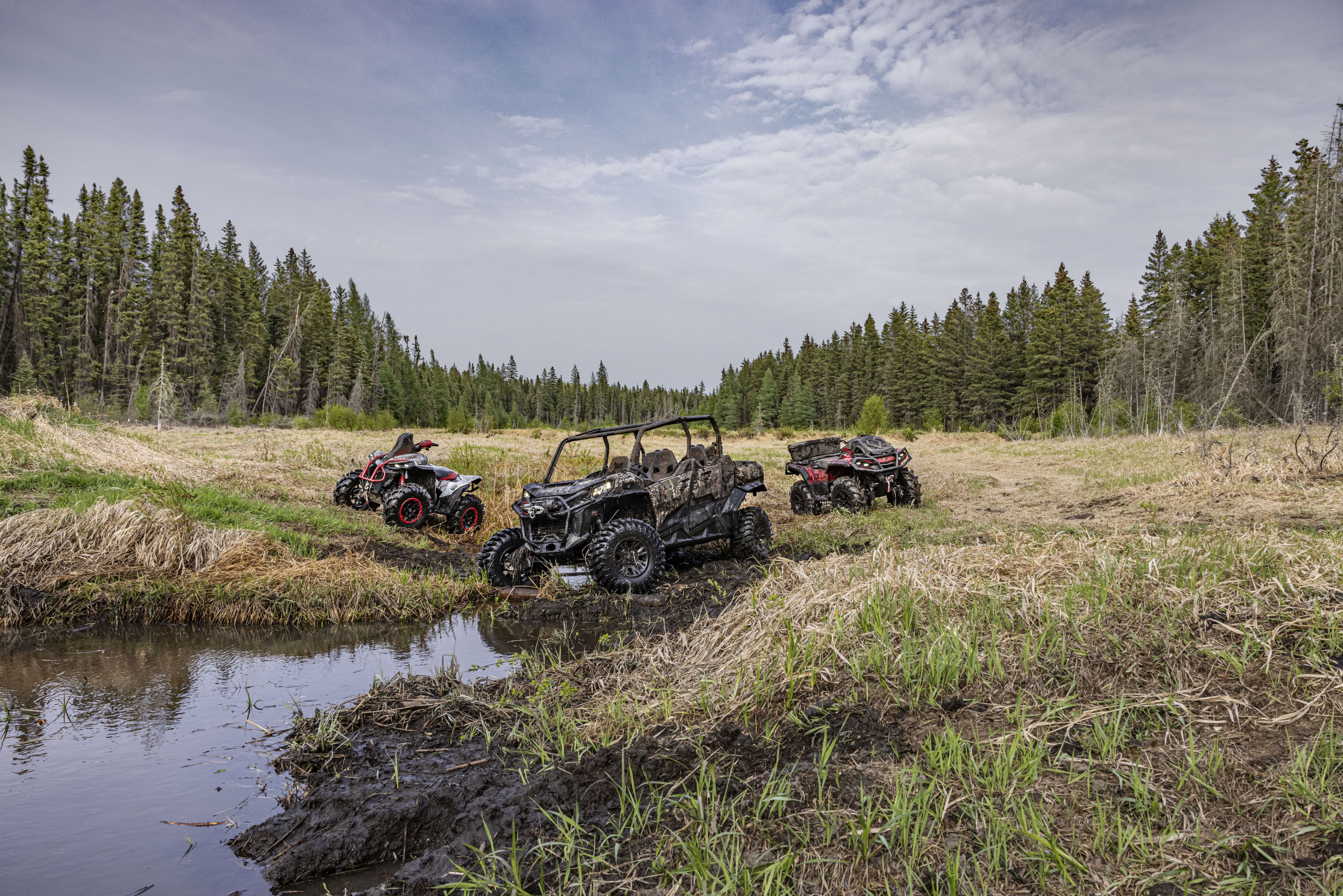 All Can-Am ATV models in a field
