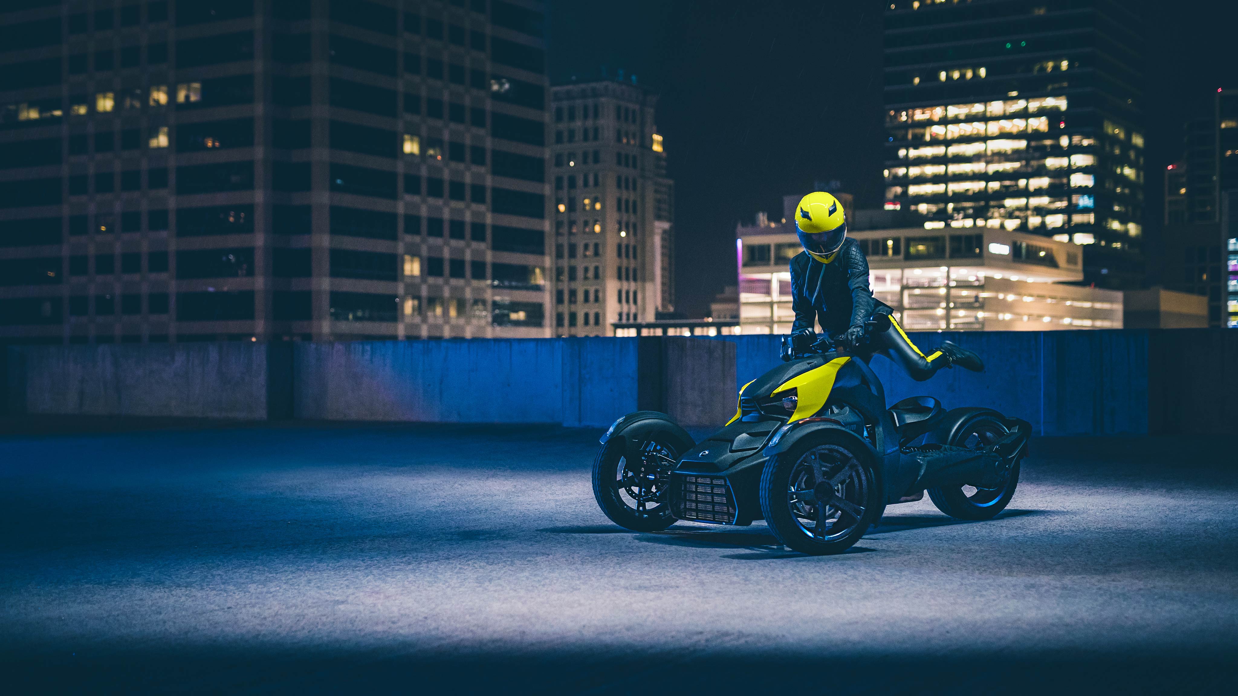Woman riding her Can-Am Ryker at night
