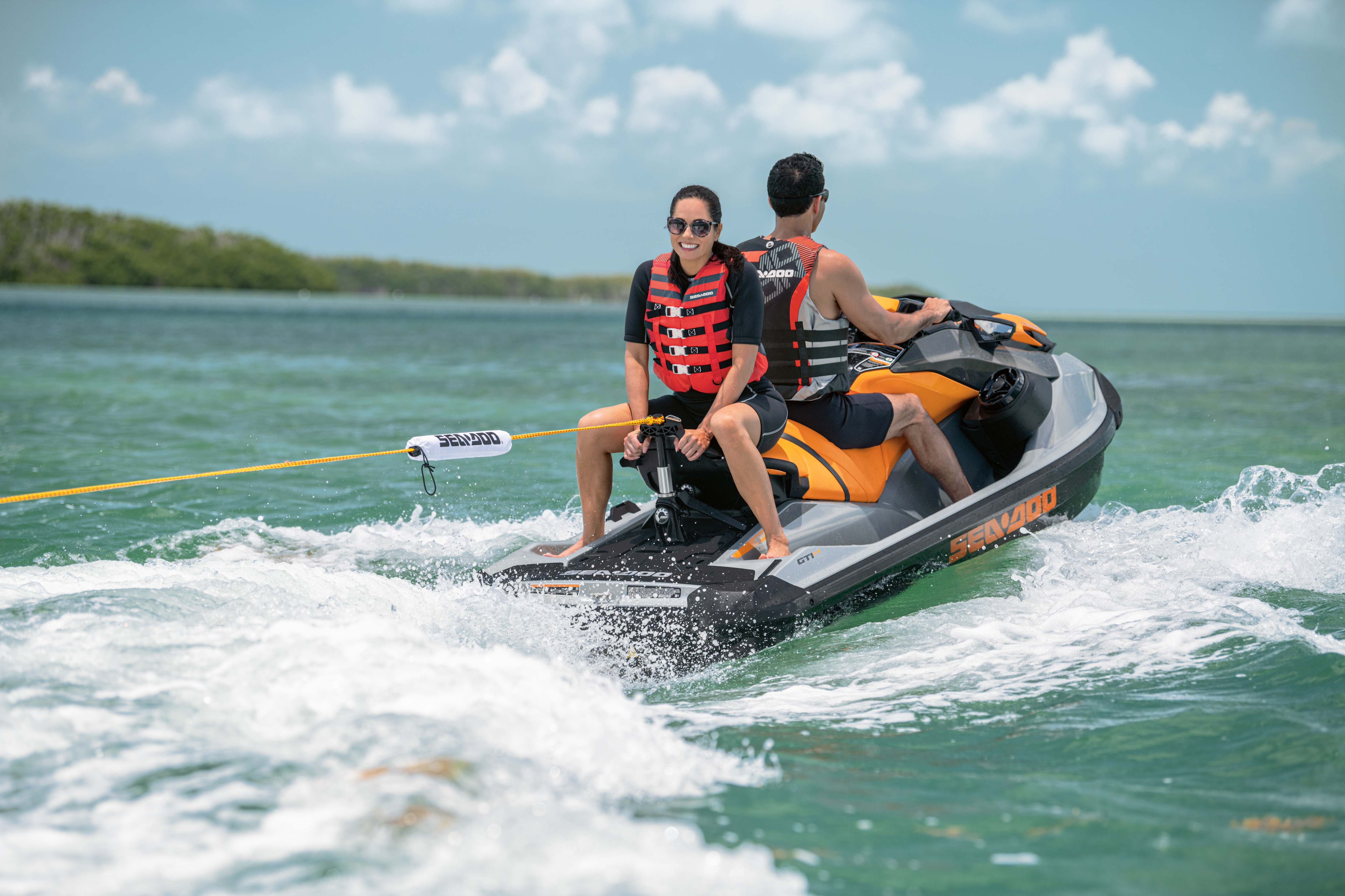 Couple towing a wakeboard on a Sea-Doo GTI SE