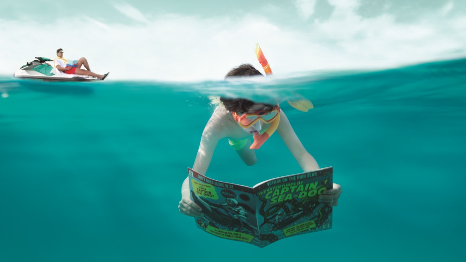  Mlado dijete čita pod vodom izdanje Captain Sea-Doo