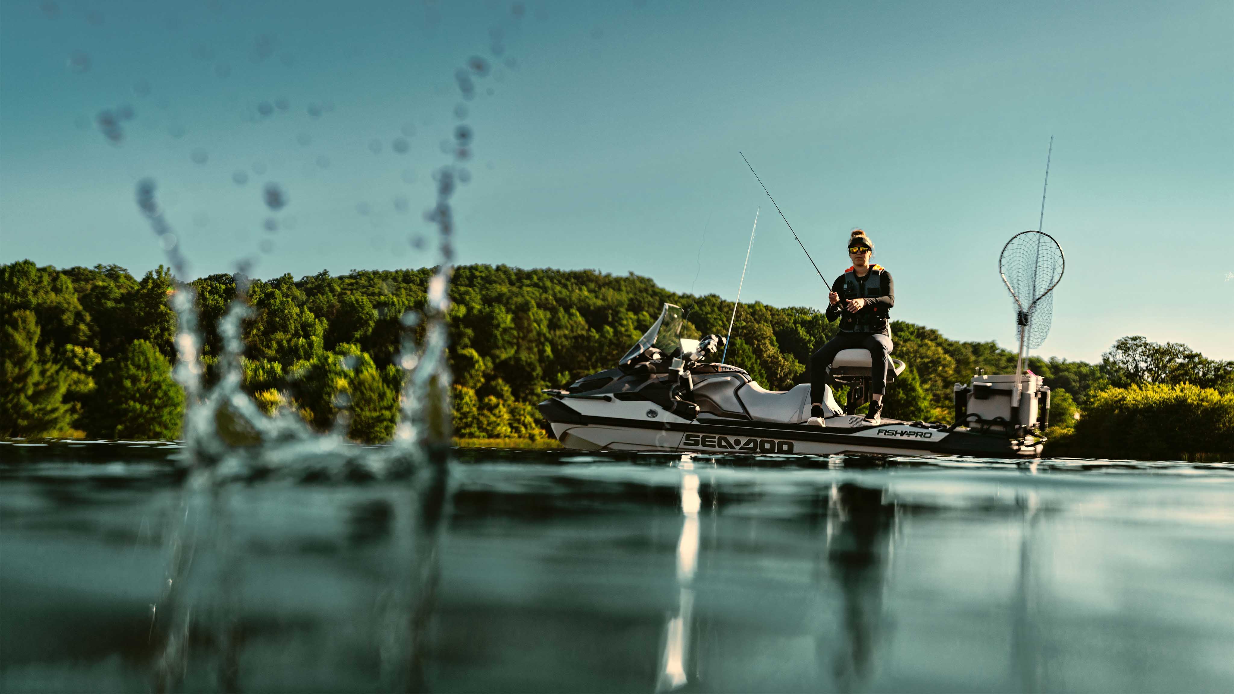 Outdoor enthusiasts fishing from his 2025 Sea-Doo FishPro Apex personal watercraft