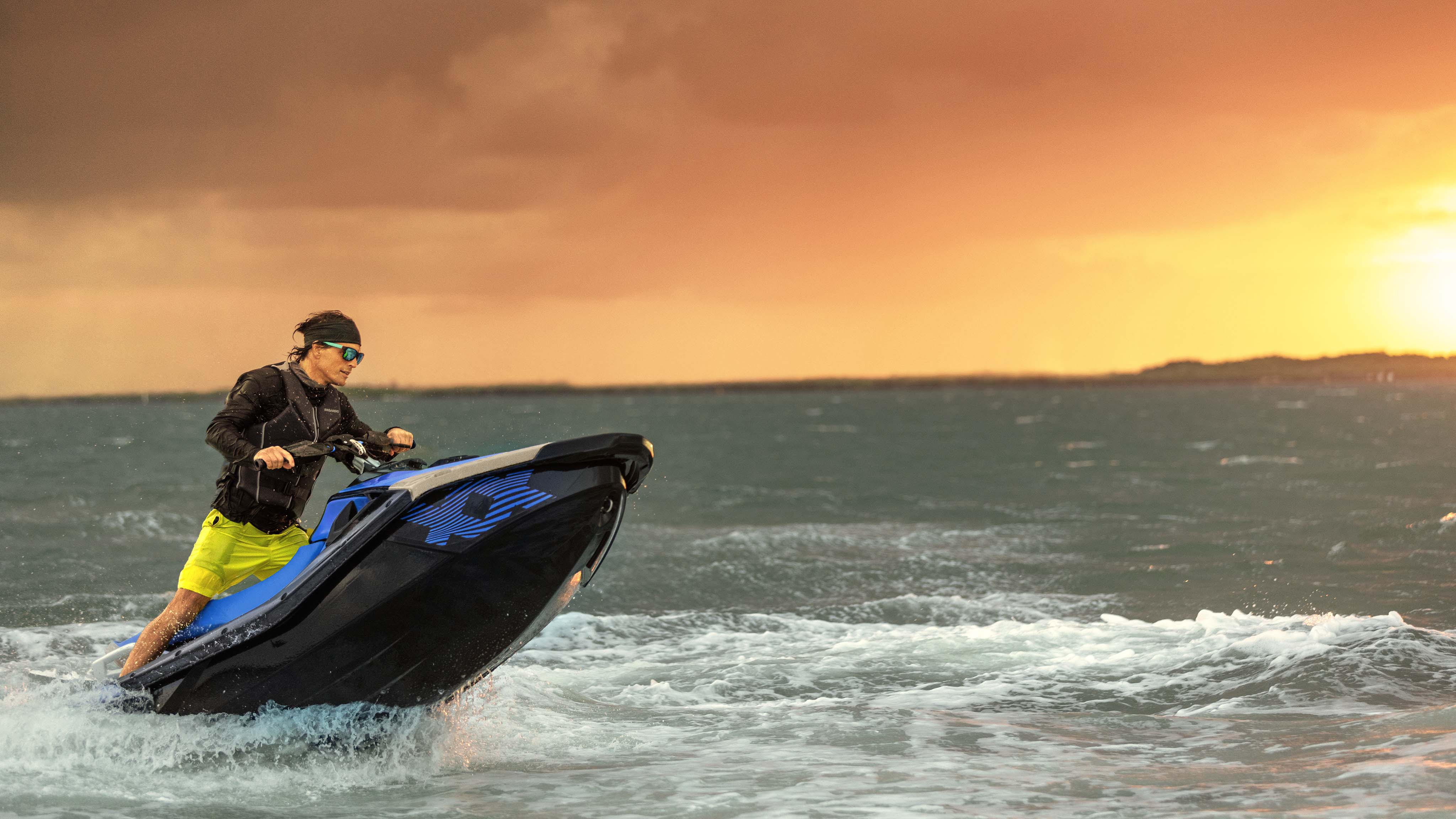 Woman riding a Sea-Doo Spark Trixx personal watercraft