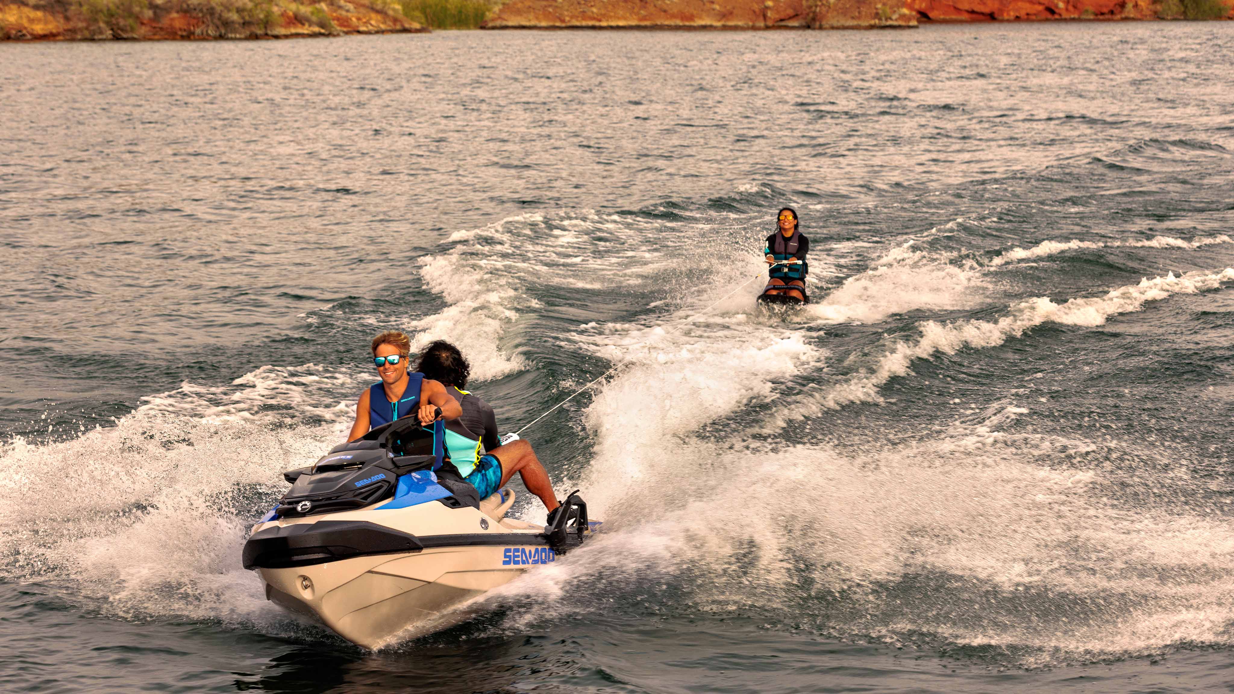 Group of friends enyoing a Wake ride with the Sea-Doo Wake Pro