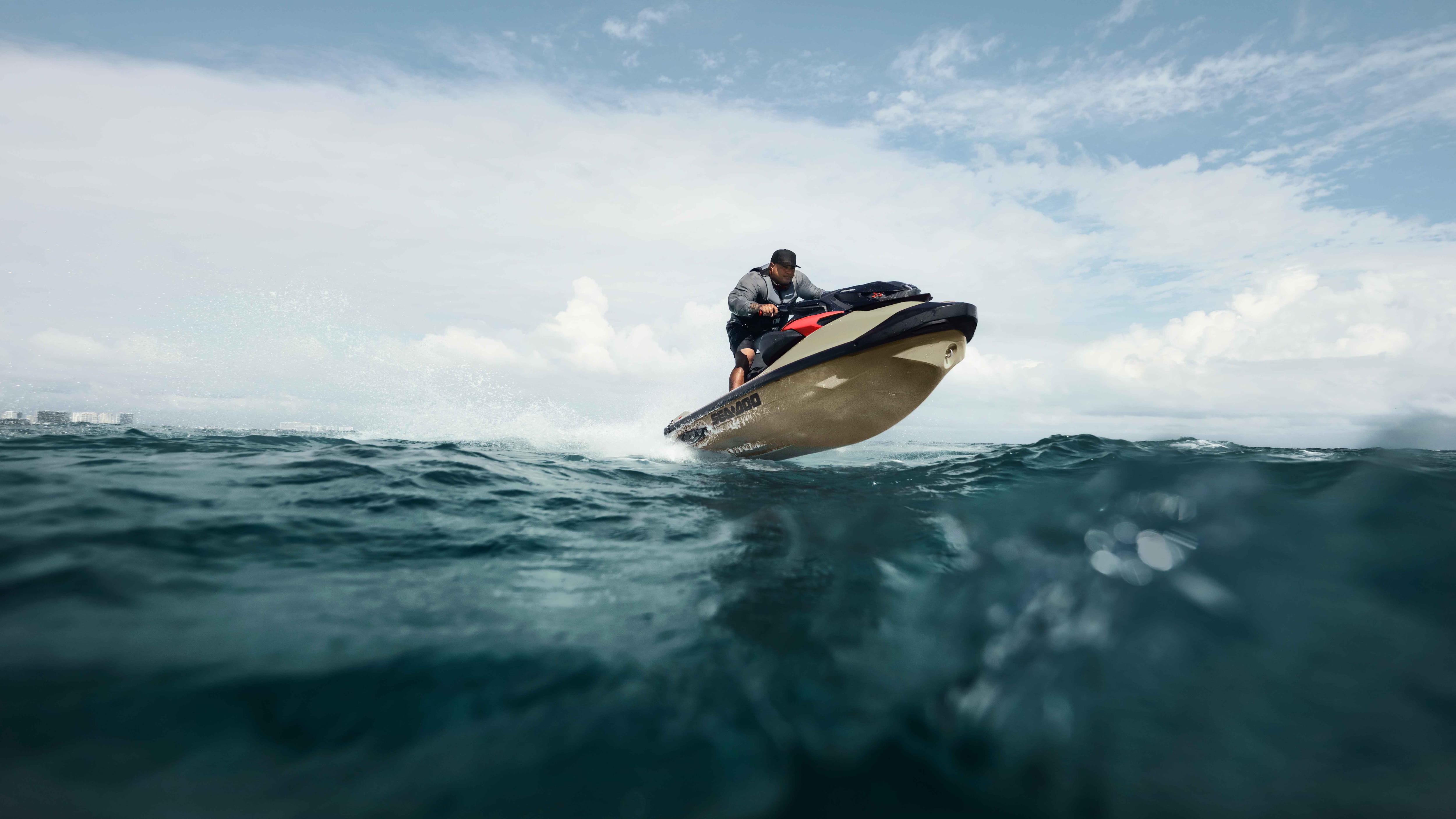 Woman riding a high performance Sea-Doo RXT-X