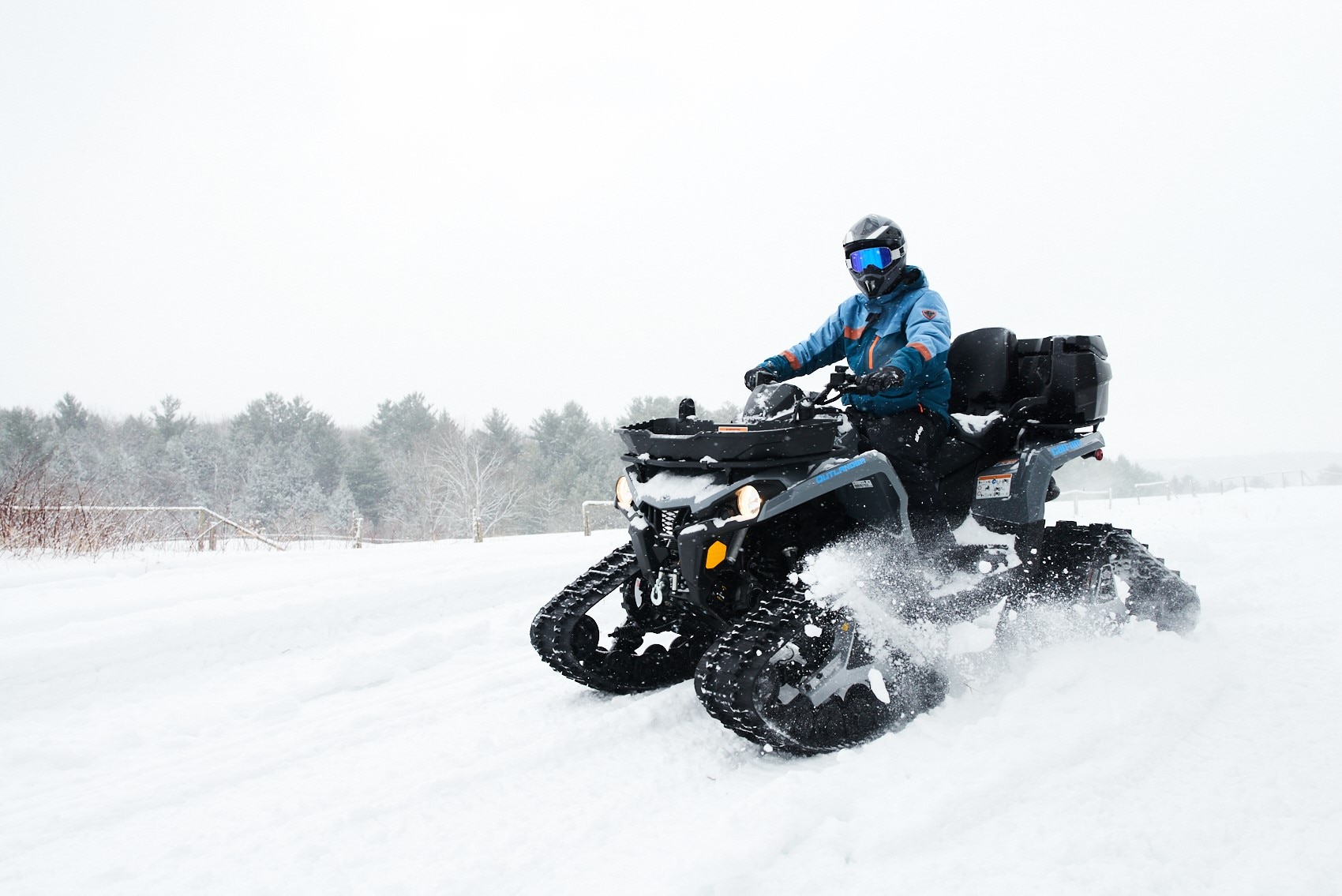 Outlander on snow with track kit